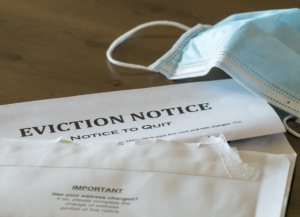 Eviction Notice with a surgical mask to represent covid eviction policies